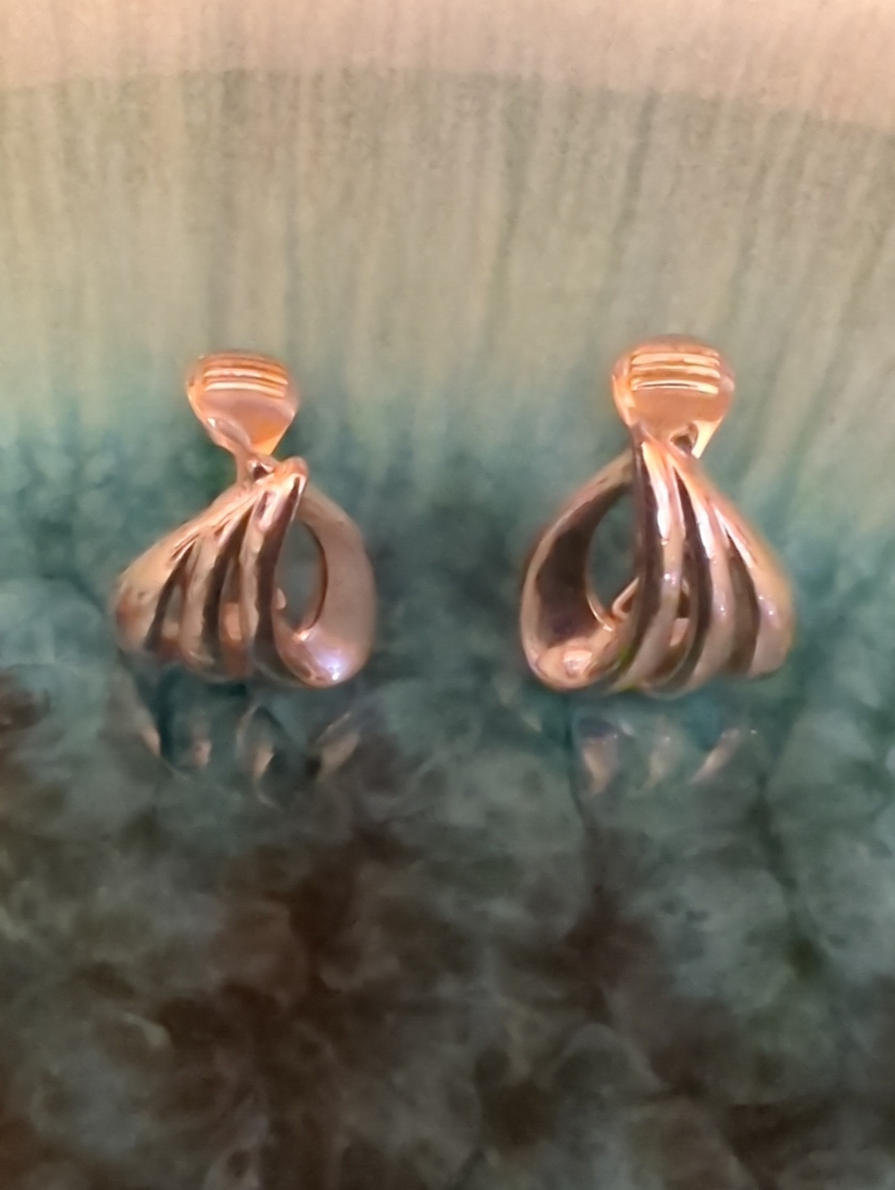 vintage Monet silver-tone stacked wave clip-on earrings.